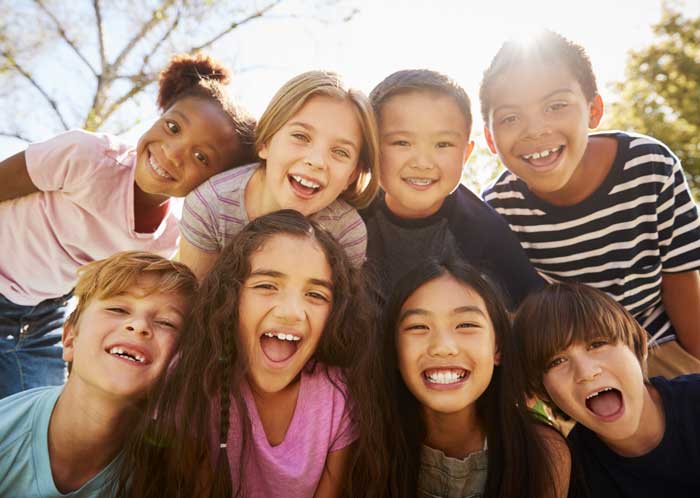 group of diverse kids smiling